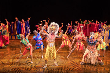 Gerald Caesar as Simba and company in THE LION KING North American Tour. Photo by Deen van Meer.