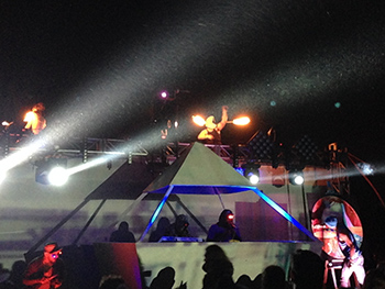 Telekinetic Walrus, Reiner Gamboa Live Painting, and Fire Dancers Perform on the Moksha Family Arts Collective Stage.