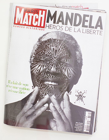 Cash, Cans & Candy exhib.  Nelson Mandela (2013), Marker on found magazine.(© Courtesy of Gallery Ernst Hilger & the artist. Photo by Katharina Stögmüller).