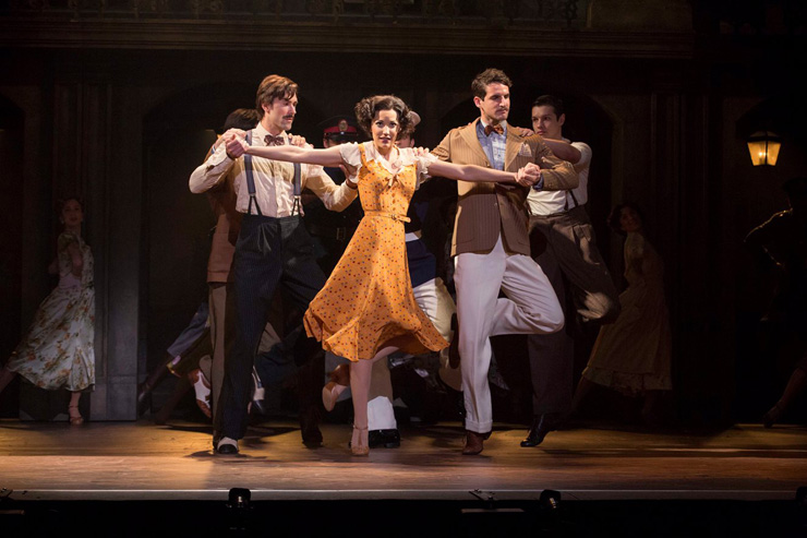 Caroline Bowman as Eva and cast in the National Tour of EVITA
