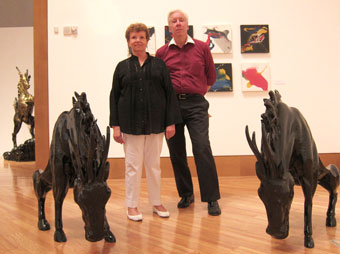 Frost Museum Chief Curator and Director Carol Damian with Emmett Young, Marketing & Communications, Simon Ma’s Dragon Colt Chairs (photo by Irene Sperber)