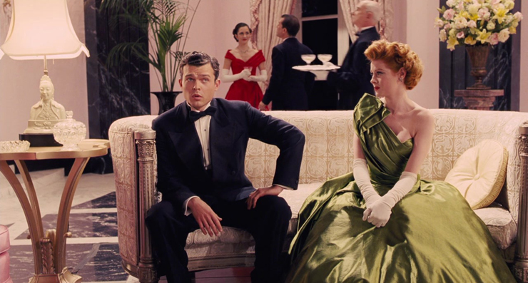 (from left): Alden Ehrenreich, Emily Beecham.