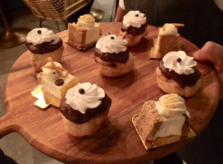 Assorted desserts including profiteroles.