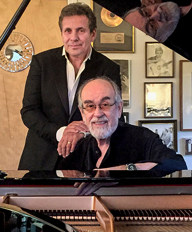 From left, singer Jake Ehrenreich and jazz musician Roger Kellaway on piano perform in 