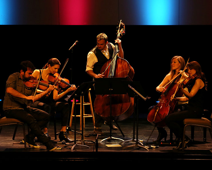 From left, Sami Merdinian (violin), Sarah Whitney (violin), Louis Levitt (bass), Laura Metcalf (cello) and Angela Pickett (viola) of Sybarite5 in concert. Photo by Bob Hunter