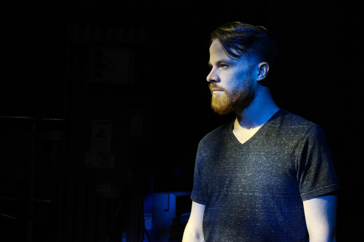 Eric O'Keefe appears as a quietly brooding, at times menacing Tom. Photos by Tall Glass.
