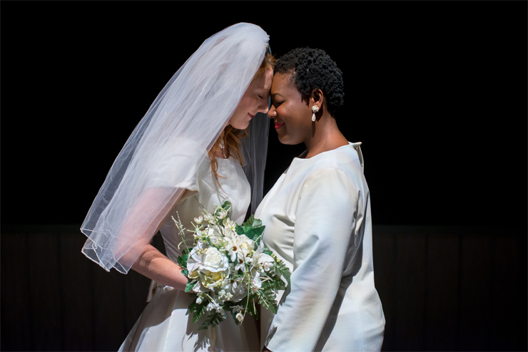 Jen (Lexi Langs) and Macy (Stephon Duncan) share an intimate moment as a married couple in 