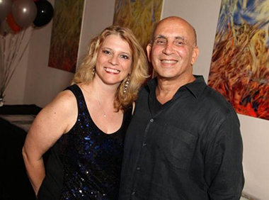 Michelle F. Solomon, miamiartzine.com editor and Harvey J. Burstein, publisher of miamiartzine.com at the 10th anniversary party.