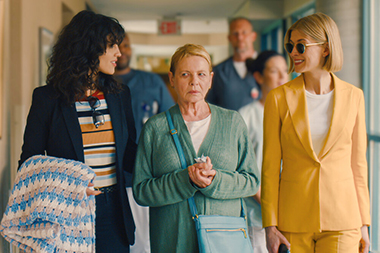 Eiza Gonzalez, Dianne Wiest and Rosamund Pike in a scene from