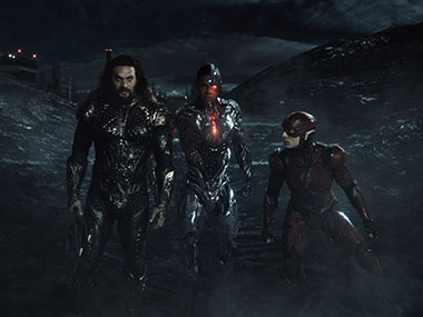 Jason Momoa, Ray Fisher and Ezra Miller in a scene from 
