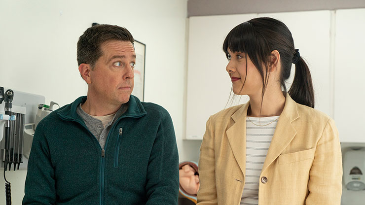 Ed Helms and Patti Harrison in a scene from