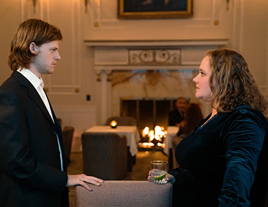 Lucas Hedges as Malcolm Price and Danielle Macdonald as Madeleine in 