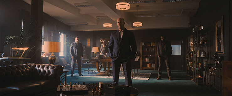 Cameron Jack as Brendan, Darrell D'Silva as Mike, Jason Statham as H, and Babs Olusanmokun as Moggy in director Guy Ritchie's