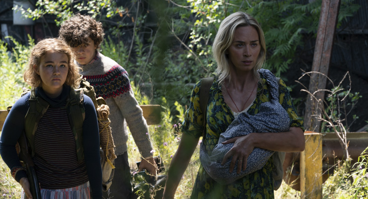 Millicent Simmonds as Regan Abbott, Noah Jupe as Marcus Abbott and Emily Blunt as Evelyn Abbott in a scene from
