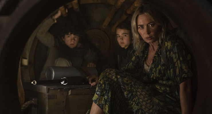 Noah Jupe as Marcus Abbott, Millicent Simmonds as Regan Abbott and Emily Blunt as Evelyn Abbott in a scene from