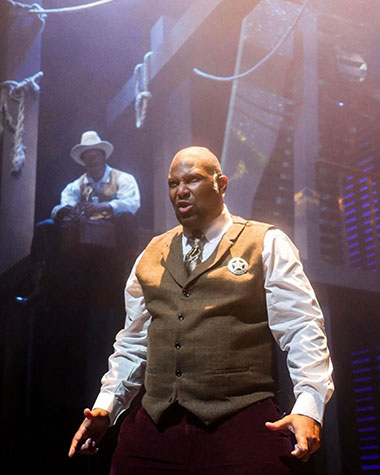 Layon Gray stars as deputy U.S. Marshal Bass Reeves in The M Ensemble's production of COWBOY (Photo by Christa Ingraham).