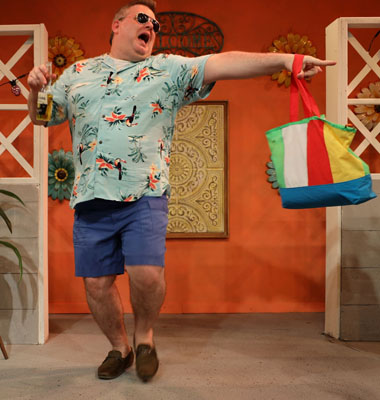 Actor Thomas Mark talking to the audience in a scene from