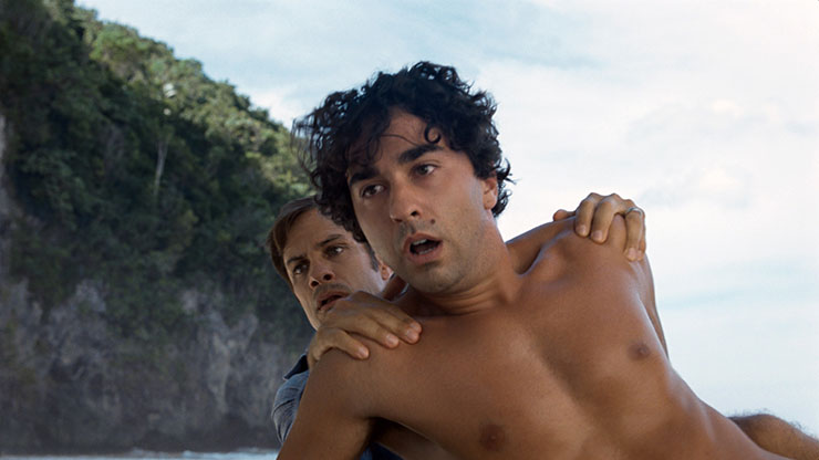 Gael García Bernal and Alex Wolff in a scene from M. Night Shyamalan's 