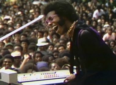 Sly Stone performing at the Harlem Cultural Festival in 1969, featured in the documentary “Summer of Soul (…Or, When the Revolution Could Not Be Televised).” (Searchlight Pictures)