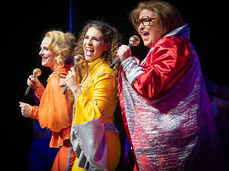 From left to right: Aaron Bower (Tanya), Jodie Langel (Donna) and Britte Steele (Rosie) perform “Dancing Queen” as  