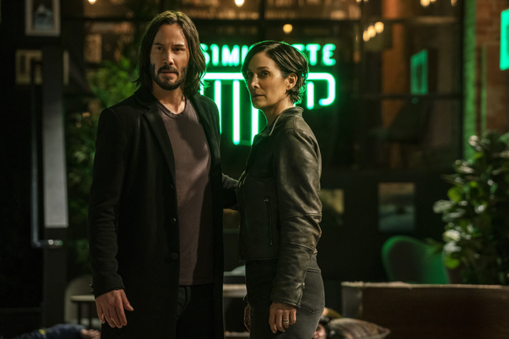 Keanu Reeves and Carrie-Anne Moss in a scene from The Matrix Resurrections. Photo Credit: Murray Close. Copyright:© 2021 Warner Bros. Entertainment Inc. and Village Roadshow Films North America Inc.