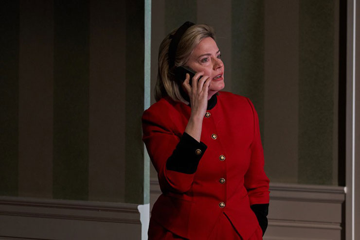 Hillary Clinton (Danielle Skraastad) angerly speaks to someone on her cell phone in Miami New Drama's world premiere 