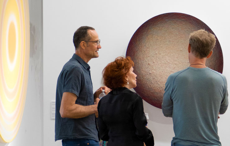 Emil Lukas discusses his work with Cricket Taplin and Robin Hill (Photo by  Betty McGhee, Piero Atchugarry Gallery)