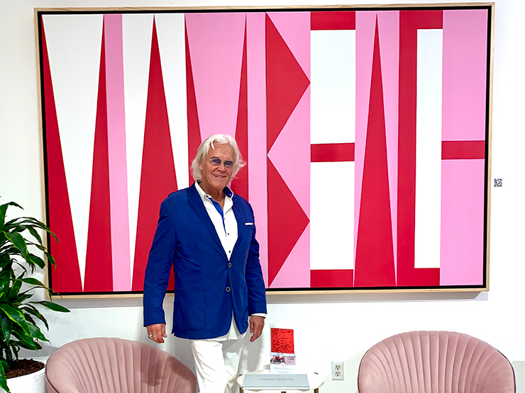 Artist Ron Burkhardt at the Sagamore Hotel with his LetterScape painting, Miami Beach Red.