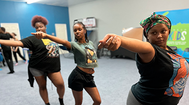Joi Armstrong, Clara Hutchins and Taylor Graham rehearse