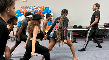 Omari White rehearse the Ensemble for