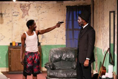 Booth (Roderick Randle, with the gun) and Lincoln (Denzel McCausland) appear in one of 