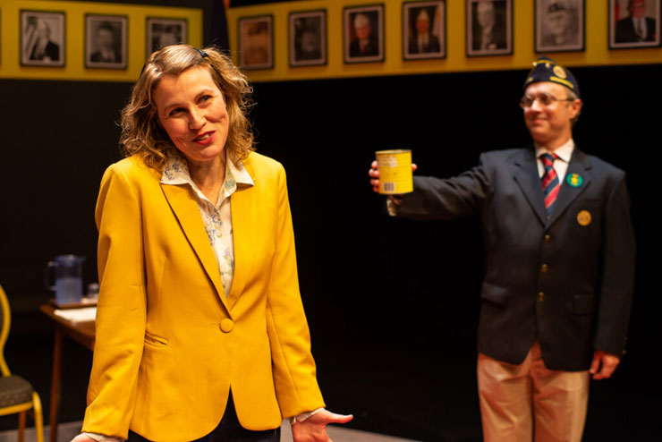 Heidi Schreck (Elizabeth Price) talks as the legionnaire (Seth Trucks) prepares to assist her in City Theatre's production of 