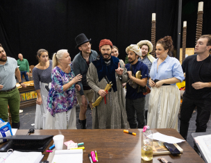 Schicchi comes up with a plan. From left to right (Front row): Robynne Redmon (Zita), Franco Pomponi (Gianni Schicchi), Phillip Lopez (Betto), Page Michels (Lauretta), Charles Calotta (Rinuccio). Back row: Eleomar Cuello (Marco), Erin Alford (La Ciesca), Anthony Reed (Simone), Ashley Shalna (Nella), Joseph McBrayer (Gherardo). (Photo by Eric Joannes)