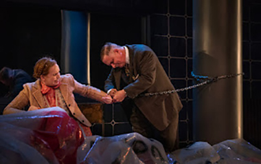 Kurt Grunwald (Jason Peck) releases Sophie Scholl (Meredith Casey) from a handcuff. (Photo by Magnus Stark)