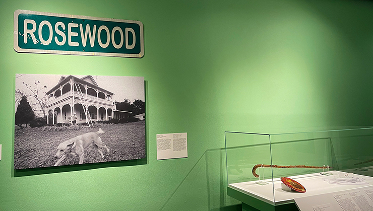 Photo of the John Wright House and Rosewood sign. (Photo of exhibition by Irene Sperber)