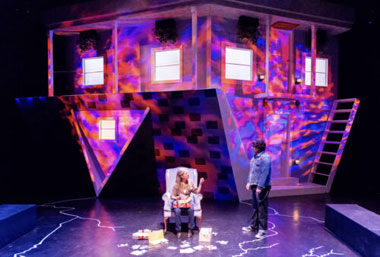 The set for the Goodman home appears upside down, symbolically suggesting that Diana's illness has figuratively turned their lives upside down, photos by Justin Namon.