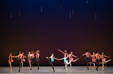 Miami City Ballet Principals Renan Cerdeiro and Jennifer Lauren in center surrounded by other MCB dancers in