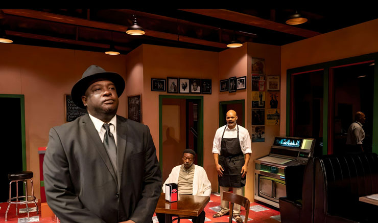 Ray Lockhart as funeral director West, Chat Atkins as Holloway and Melvin Huffnagle as Memphis in M Ensemble's 