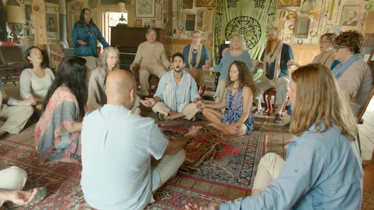 Jesse Tayeh as Arlo and Isabelle Muthiah as Celeste (center, sitting) in a scene from