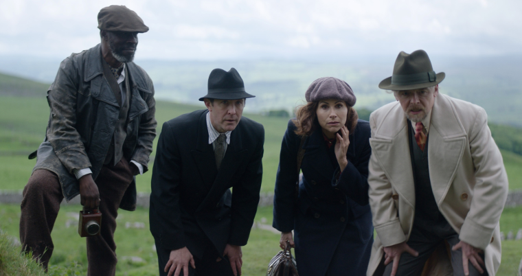Gary Beadle as Errol, Tim Downie as Mr. Irving, Minnie Driver as Anne and Simon Pegg as Nandor Fodor in a scene from