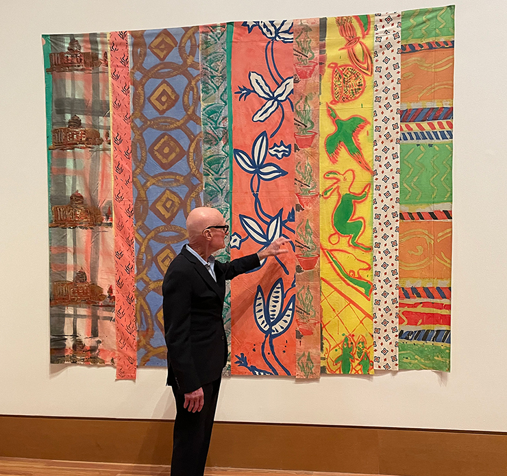 Artist Kim MacConnell discussing his large-scale work at the Frost Museum. (Photo by Irene Sperber).