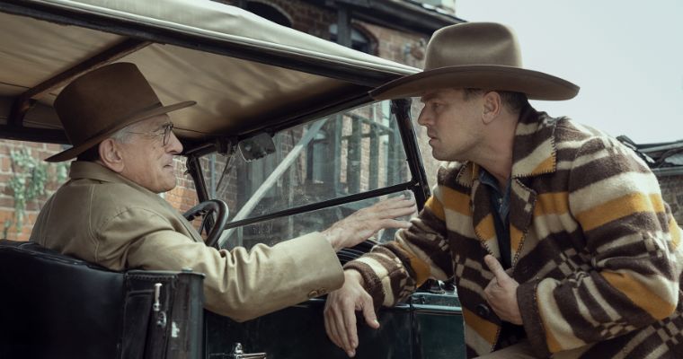 Robert De Niro as William Hale and Leonardo DiCaprio as Ernest Burkhart in a scene from
