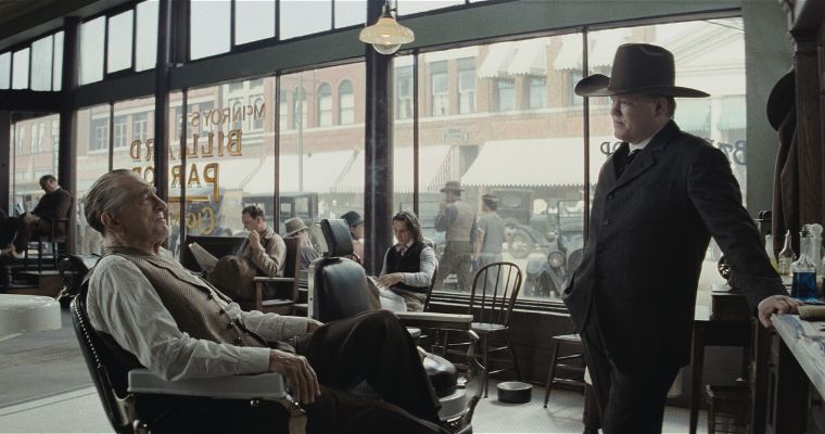 Robert De Niro as William Hale and Jesse Plemons as Tom White in a scene from