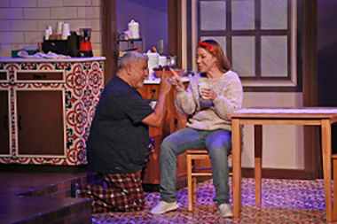 JL Rey as Tio Eme and Melissa Ann Hubicsak as Beatriz appear in a scene from Actors' Playhouse at the Miracle Theatre's production. (Photo by Alberto Romeu)