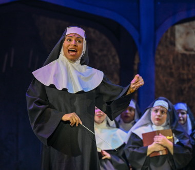 The nuns look on in disbelief as Deloris Van Cartier (aka Sister Mary Clarence), played by Mandi Jo John, takes charge.