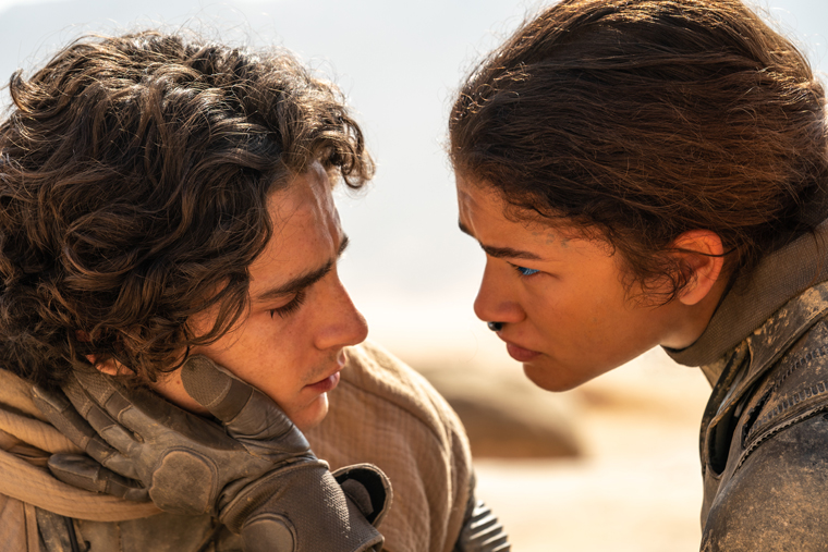 Timothée Chalamet as Paul Atreides and Zendaya as Chani in a scene from 