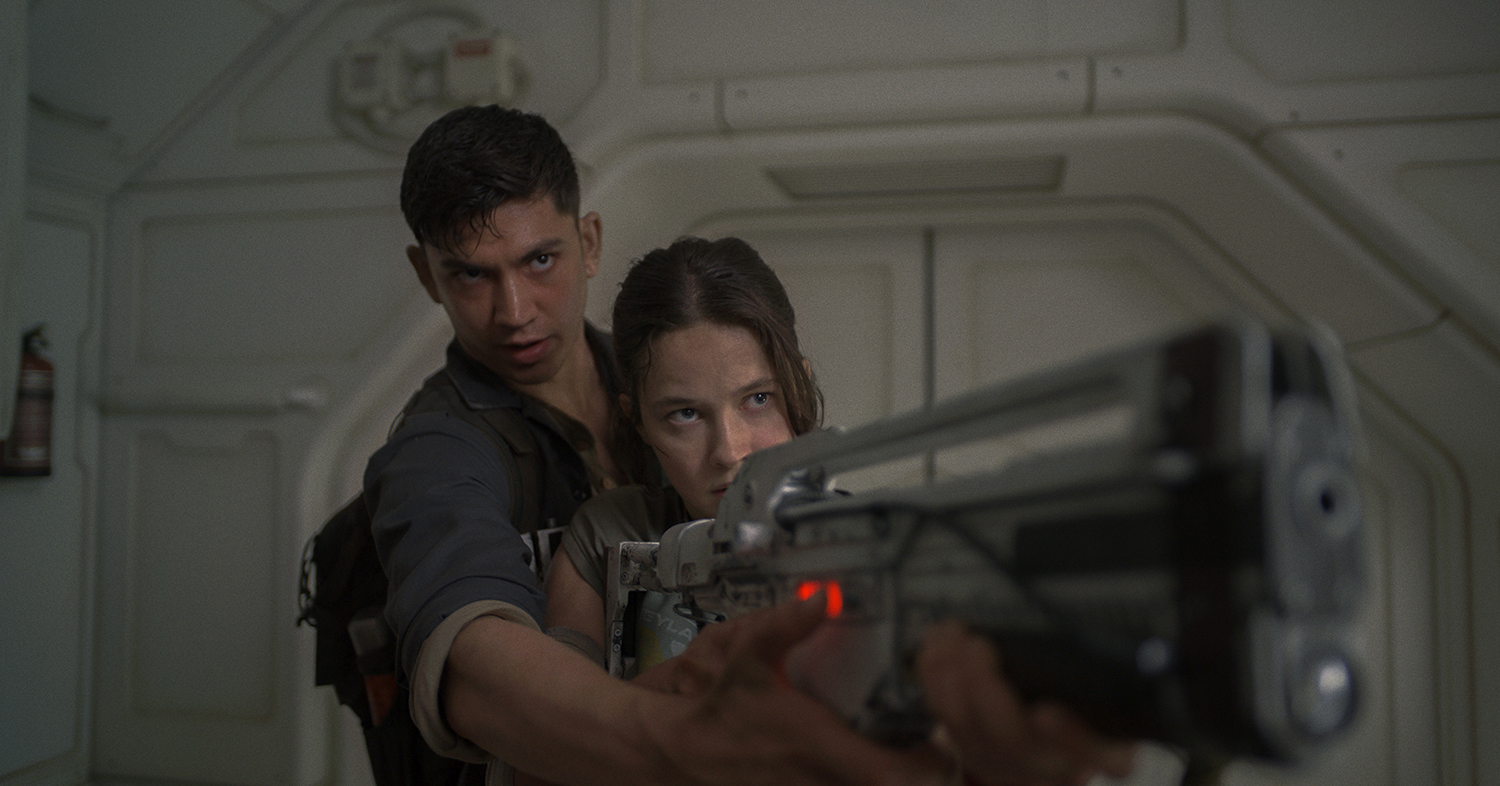 Archie Renaux as Tyler and Cailee Spaney as Rain Carradine in a scene from