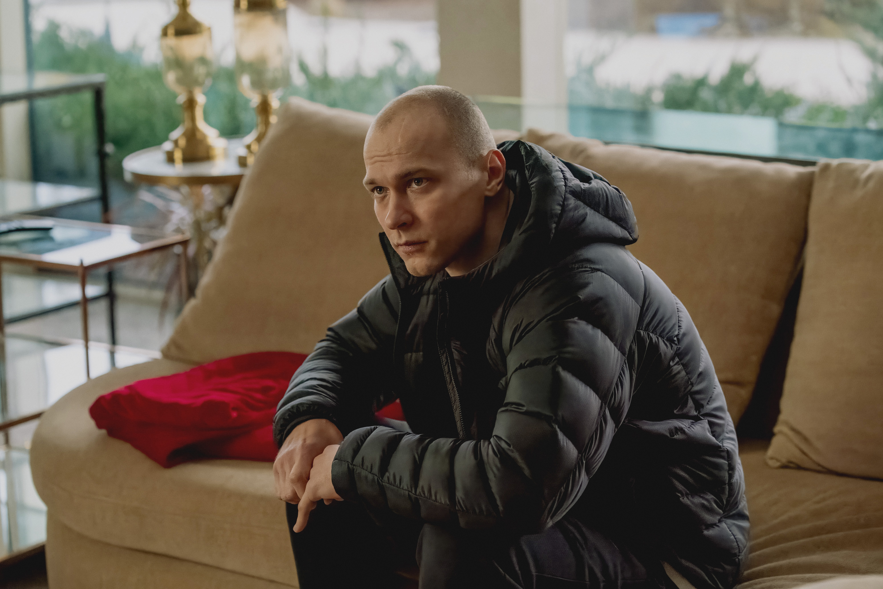 Yura Borisov as Igor in a scene from