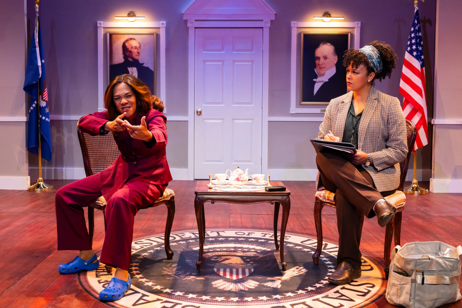 Karen Stephens as The First Lady and Renata Eastlick as Chris, a newspaper journalist, in
