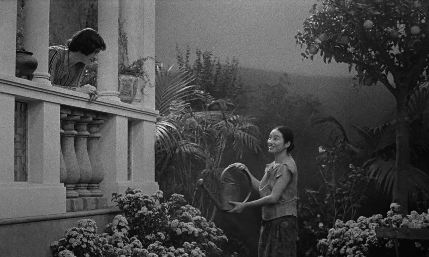 Crista Alfaiate as Molly Singleton and Lang Khê Tran as Ngoc in a scene from